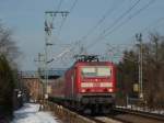 BR 143 mit Zugen 143 158-4 mit RE 15419 Koblenz Hbf - Frankfurt(Main)Hbf zwischen Wiesbaden-Ost und Mainz-Kastel. 17.02.10