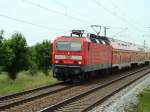 BR 143 mit Zugen 143 038-8 mit RE, in Gerichshain Richtung Dresden, 10.06.2010.