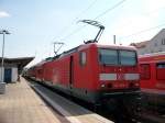 BR 143 mit Zugen 143 564 ist mit der Rostocker S-Bahn aus Warnem�nde am 03.Juli 2010 in G�strow angekommen.Nach wenigen Minuten ging es �ber Schwaan wieder zur�ck nach Warnem�nde.