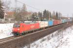 BR 145 mit Zugen 145 012-1 mit bunten Kisten auf dem Weg Richtung Braunschweig. Fotografiert am 14.02.2010 in Magdeburg Diesdorf. 