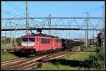Rohre f�r Mukran.155 214-0 & 140 801-2 vor einem R�hrenzug ...