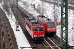 BR 155 W�hrend am 18.02.10 155 086 solo aus Richtung Halle kommend Richtung Bitterfeld f�hrt, schiebt 101 118 ihren IC Richtung Halle(S).