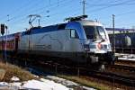 182 004-2 Porsche zieht am 25.02. 10 den RE nach Leipzig ...