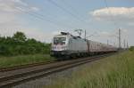 BR 182 182-004 mit einem RE von Cottbus nach Leipzig auf der KBS 215 bei Eilenburg erwischt.(18.6.2010)Leider mit 'Wolkenschaden'