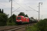 BR 182 182 021 mit einem Kesselwagenzug am 17.07.2010 bei Freilassing.