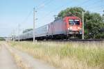BR 182 182 003-4 mit dem EC 340 nach Hamburg zwischen Gro�wudicke und Rathenow. Bestehend aus 4 IC-Waggons und 2 PKP-Waggons. 25.07.2010