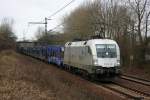 br-182-private ES64U2-100 mit einem leeren Autozug am 13.3.10.