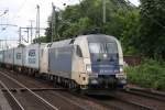 br-182-private ES 64 U2 024 der WLB mit einem Containerzug in Hamburg Harburg am 06.07.2010.