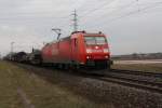 BR 185 mit Zugen 185 196 mit GZ in Richtung Mannheim.Am 20.02.10 in Lampertheim.