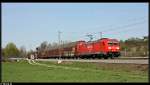 BR 185 mit Zugen 185 246 mit ihrem leeren Autozug bei Helmsheim. Aufgenommen am 09.04.10