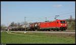 BR 185 mit Zugen 185 356 mit ihrem �lzug hat gerade den Haltepunkt Helmsheim passiert und f�hrt weiter richtung Stuttgart. Aufgenommen am 09.04.10