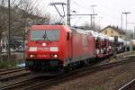 BR 185 mit Zugen 185 299-5 Ausfahrt aus dem Bhf. Kornwestheim Pbf am 16.4.2010 mit gemischtem G�terzug