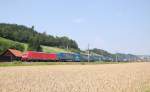 BR 185 mit Zugen Mit einem Containerzug ist die 185 371 am 17.07.2010
in Schl�sslberg bei Grieskirchen durchgefahren.
