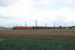 BR 185 mit Zugen 185 046-0 + 185 318-3 mit einem Kohlezug in Sechtem am 19.06.2010