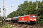 BR 185 mit Zugen 185 299 mit einem Kesselwagenzug am 08.07.2010 in Eystrup.