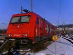 br-185-private BR 185 der HGK AG im Ulmer Hbf beim Winterschlaf auf Gleis 2a.