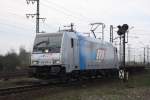 br-185-private 185 576 mit einem leeren Containerzug in Lehrte am 30.03.2010 