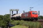185 606 mit einem Kesselwagenzug in Richtung Harburg am 27.06.2010 ...