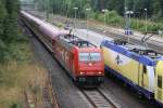 br-185-private 185 606 mit einem Sonderzug zum Schlagermove mach Hamburg am 17.07.2010 in Tostedt