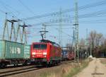 189 004-5 hat soeben einen Containerzug nach Hamburg-Waltershof gebracht und ...