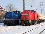 298 312 rangiert in Bad Kleinen an der abgestellten 202 ...