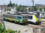 BR 21 Am 11.07/2010 sonnen sich 2148 und 1347 Seite an Seite im Bahnhof Welkenraedt.