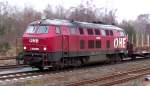 OHE 200085 f�hrt mit einen leeren Holzzug durch Munster, weiter ...