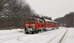 218 329-1 am 14.02.2010 mit einem RE nach Kiel Hbf ...