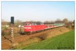 219-192 vor einer Regionalbahn ...  Olaf Herrig 16.11.2009