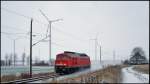 BR 232 Lokportraits 232 461-4 ist bei leichtem Schneetreiben am 17.12.2009 zwischen Langenhanshagen und Altenwillershagen in Richtung Rostock unterwegs.