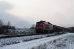 BR 233 mit Zugen Mit Blick auf den teilweise wolkenverhangenen 'Monte Kali' bef�rdert 233 521-4 am 18.12.09 einen Kalizug nach Gerstungen.