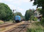 253 015 mit einem Holzhack in Niesky am 29.06.2010  ...