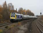 BR 264 Voith Maxima 40 CC Voith Maxima 40 CC der MEG  mit einen langen Zementzug am Haken bei der Durchfahrt durch Netschkau.11.11.09.