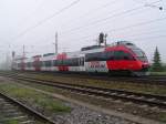 br-4024 4024022-8 entschwindet als REX3006 bei Redl-Zipf im Nebel;090916
