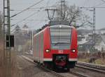 425 572-5 als RB11072 nach Duisburg am Km 28.9 der ...