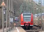425 569-1 als RB11070 nach Duisburg bei der Ausfahrt in ...