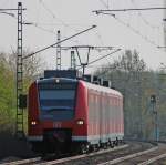 br-425 425 579-0 als RB11076 nach Duisburg am Km 20.8, 18.4.10