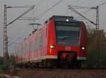 br-425 425 075-9 als RB11081 nach Aachen am Km 25.8, 18.4.10