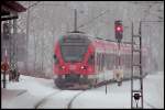br-429-stadler-flirt-5-teillig Ein Flirt,mit Ziel Sassnitz, verschwindet am Bhf Stralsund R�gendamm im Schneegest�ber. 