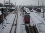 Einfahrender RE 33314 Binz-Stralsund am 21.Februar 2010 in Bergen/R�gen.  ...
