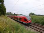 br-429-stadler-flirt-5-teillig Die sch�nsten Motive an R�gen`s Hauptstrecke gibt es zwischen Lietzow und Bergen/R�gen.Einziger Nachteil man mu� schon einige Kilometer gehen um zu den Fotostellen zugelangen.So fotografierte ich,nach einem Fussmarsch,in einer Kurve zwischen Lietzow und Bergen,den 429 028 am 13.Juli 2010 als Dieser unterwegs von Sassnitz nach Rostock unterwegs war.