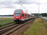 br-429-stadler-flirt-5-teillig 429 028 erreichte am 26.Juli 2010 mit dem RE 33311 Stralsund-Binz das Ende der zweigleisigen Strecke Altef�hr-Lietzow vor Lietzow,weiter geht es nur noch eingleisig.