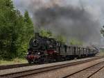 BR 58 Die 58 311 am 23.05.2010 mit einem Pendelzug bei der Ausfahrt aus Neuenmarkt-Wirsberg. 