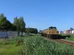 6414 mit einem G�terzug ...  Date Jan de Vries 06.06.2010