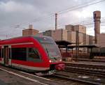 br-646-stadler-gtw-db 646 206 ('Korbach...Goldrichtig') als RB23574 in Wabern(Bz Kassel), 20.2.010. Im Hintergrund ist die dortige Zuckerfabrik zu sehen.
