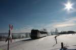 Als VBG83210 ist VT33 bei Auerbach/Vogtl. ob. Bf unterwegs. (17.02.2010) ...