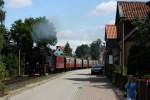 BR 99.72 99 7240 zieht ihren Personenzug zum Broken hinauf und wir gleich in Wernigerode Hasserode einfahren. Leider lief mir ein Kind ins Bild:-( (25.7.2010)