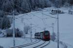 brennerbahn 4024 093-9 bremst sich am 27.12.2009 in der Gleichnamigen Kurve als S-Bahn zum n�chsten Haltepunkt St.Jodok die Brennerrampe herunter.