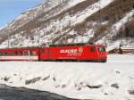 Brig-Visp-Zermatt-Bahn HGe 4/4 II 4 mit Werbung 'GLACIER EXPRESS' - T�sch - 04-02-2010