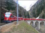 brucken R1644 mit ABe 8/12 3503 'Carlo Janka' auf Bergfahrt Richtung St.Moritz. (20.05.2010)